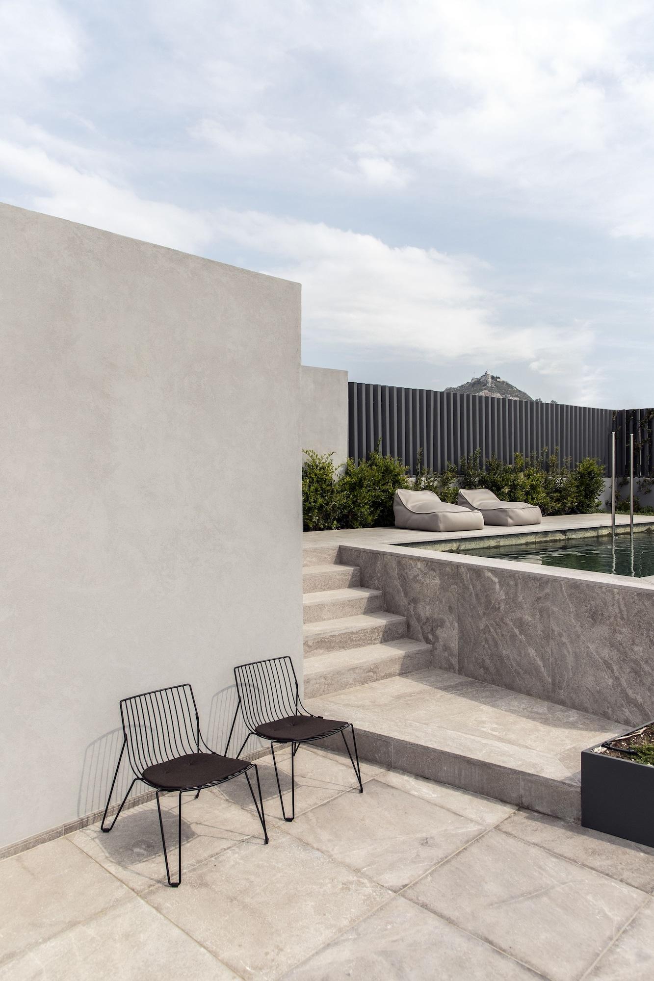 Perianth Hotel Athens Exterior photo Exterior wall and pool tiles